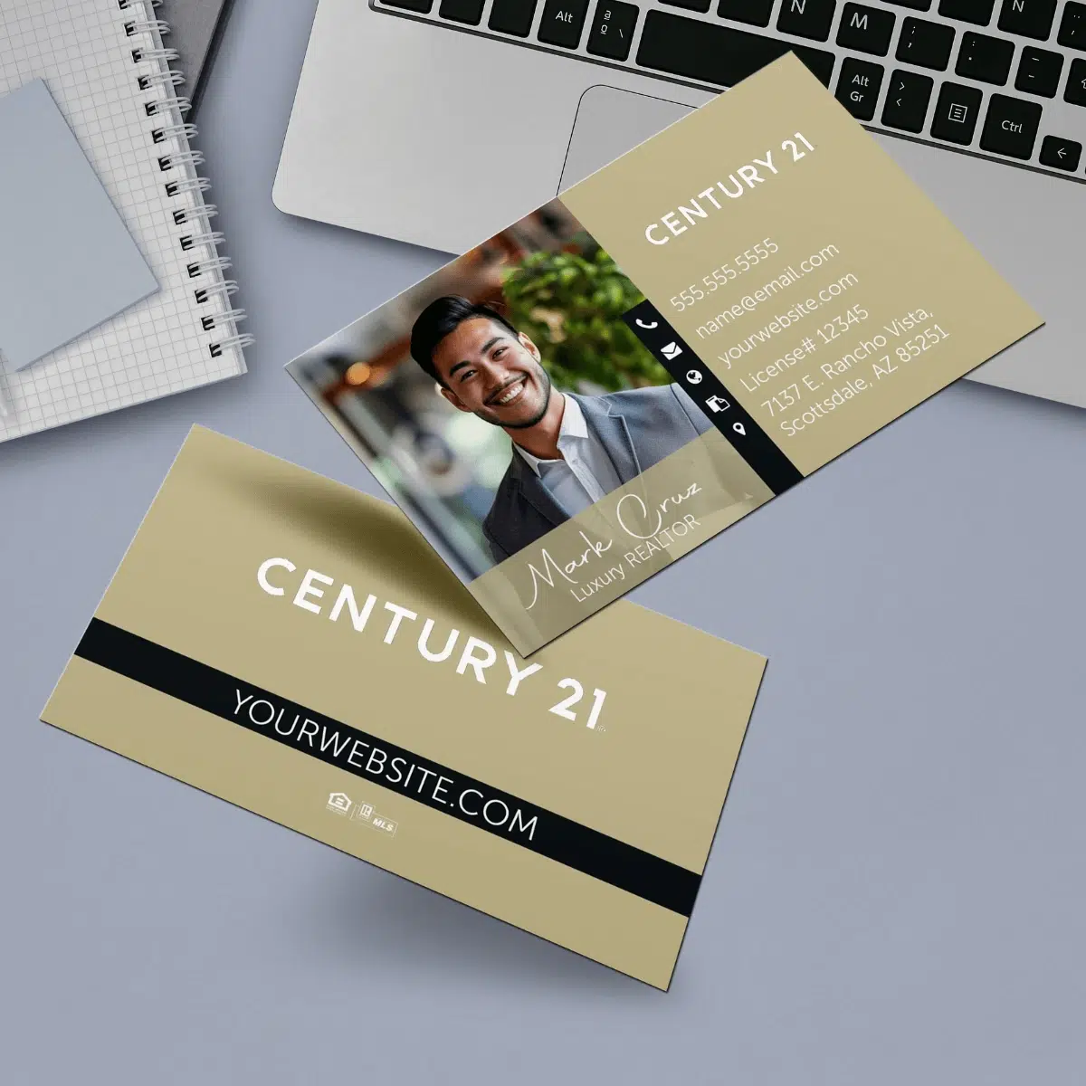 A gold horizontal century 21 business card for real estate.